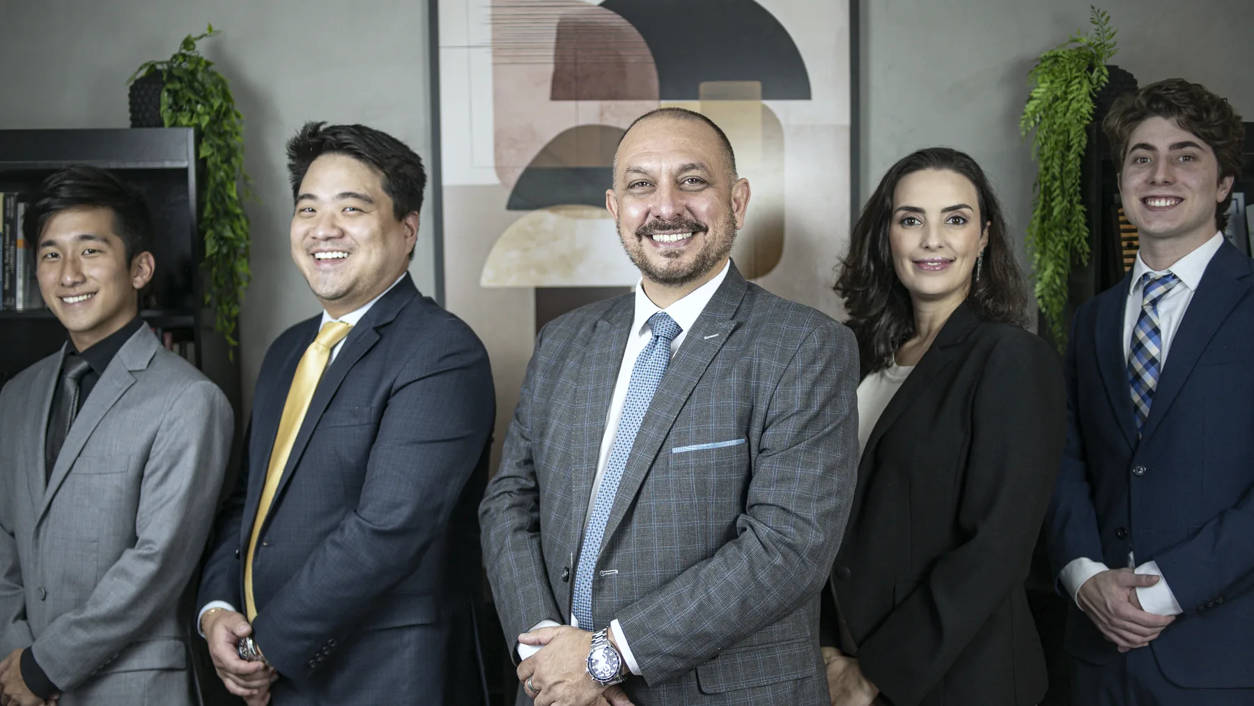 Equipe do CNK Advogados no escritório